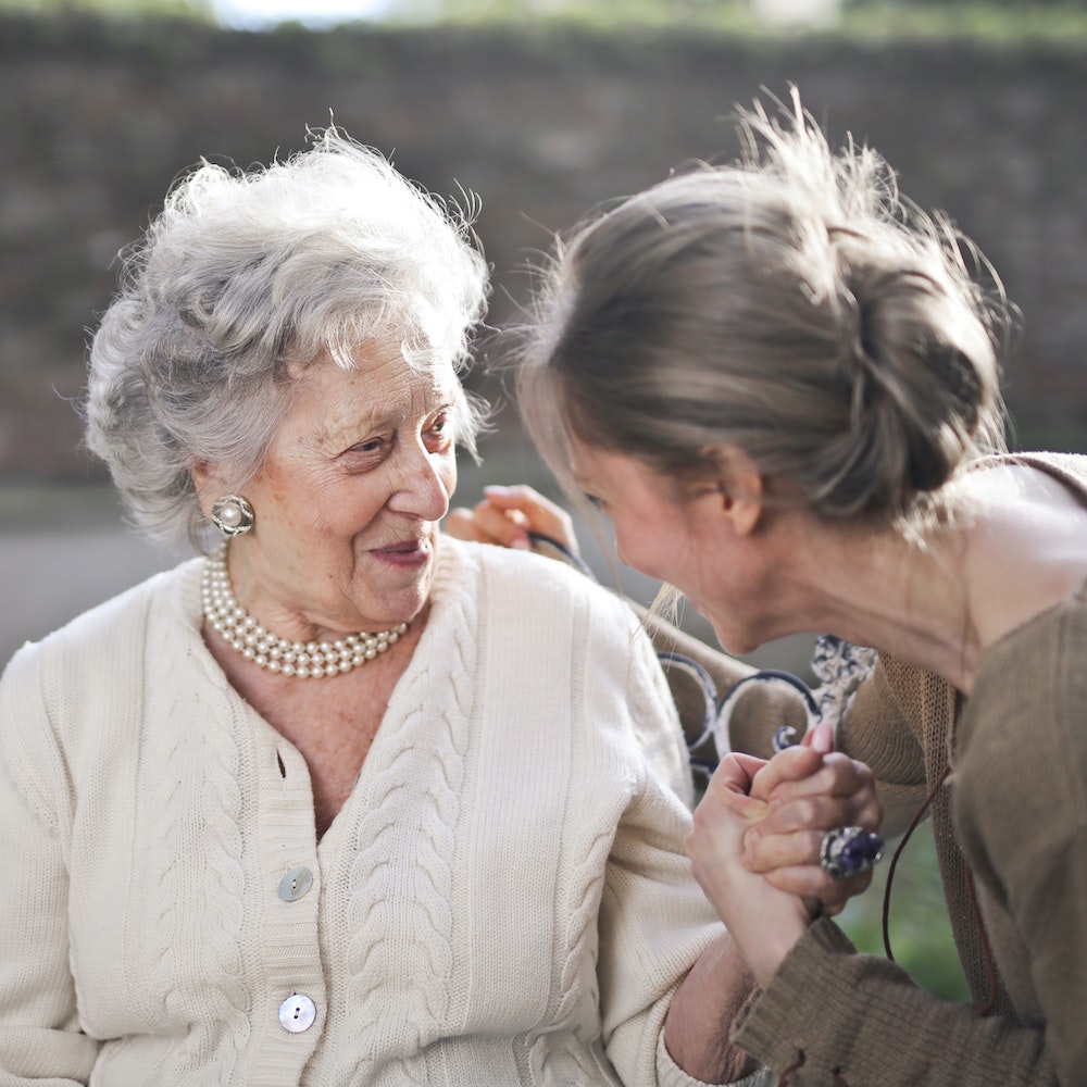 Two old people talking