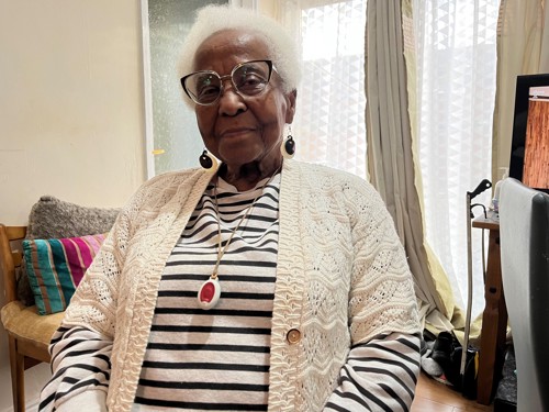 A photo of Dorothy Maitland wearing her Nottingham on Call pendant